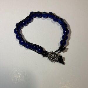 Blue Beaded Bracelet with Silver Flower Clasp